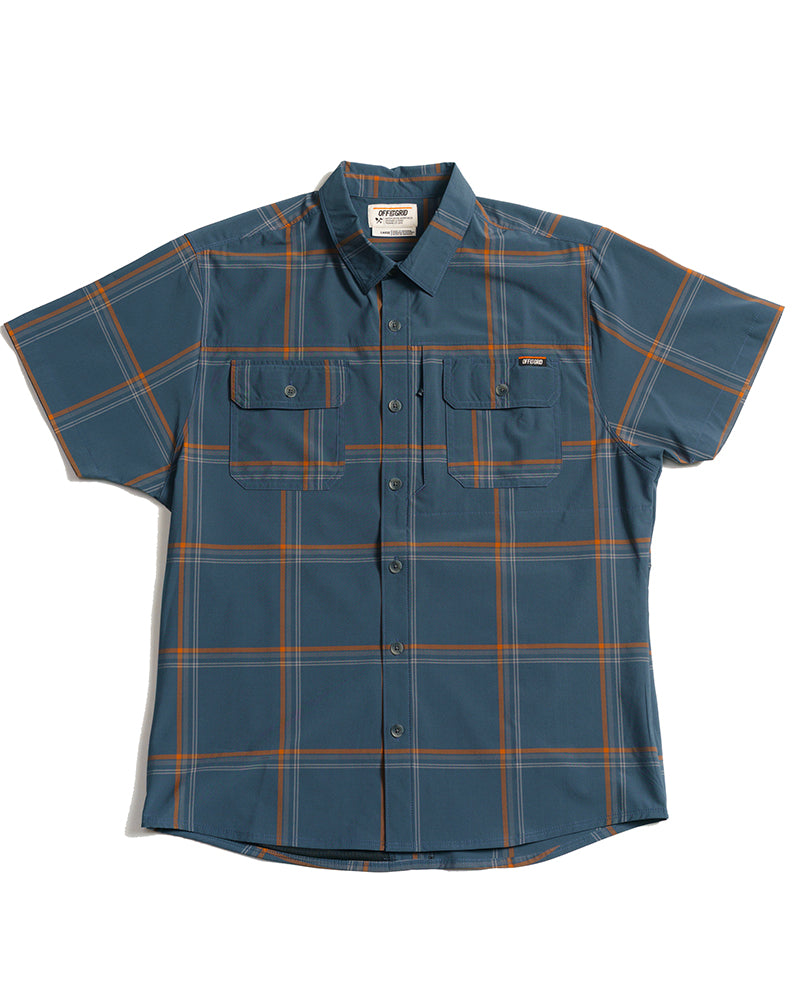 Dark gray-blue short sleeve Jack Knife SS shirt by Off The Grid Surplus, shown on a hanger with visible fabric details.