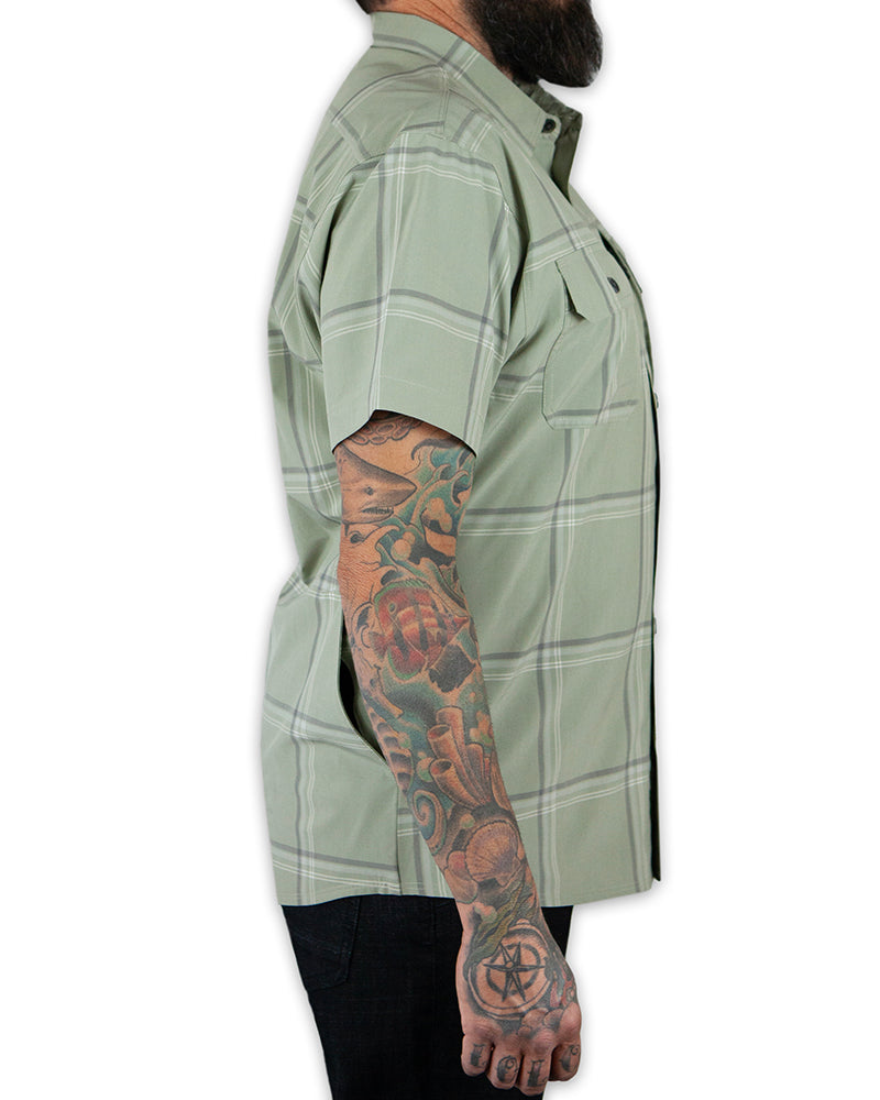 Sage green Jack Knife SS shirt by Off The Grid Surplus, short sleeve with collar and button front, displayed on a hanger.
