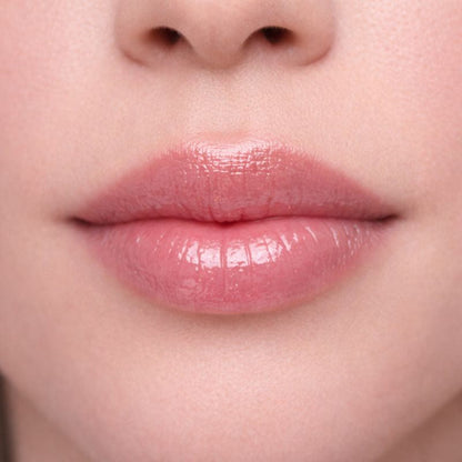 Shiny diamond lip gloss by KE Cosmetics featuring a clear tube with a sparkling, glossy finish for luscious lips.
