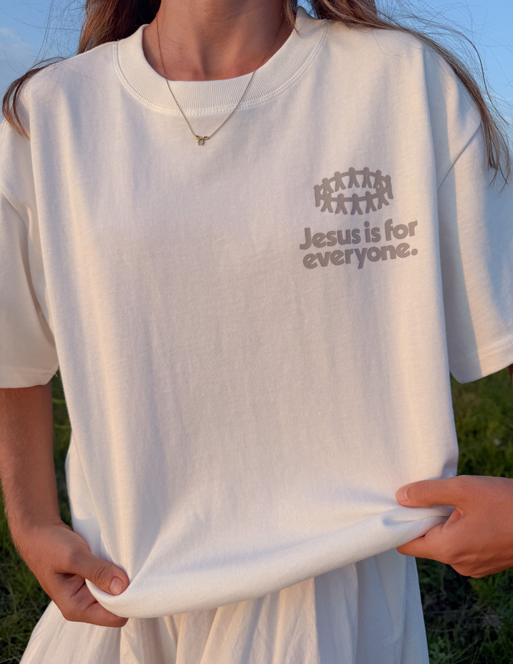 Black heavyweight Jesus Is for Everyone T-shirt by Elevated Faith featuring a bold religious graphic on the front.