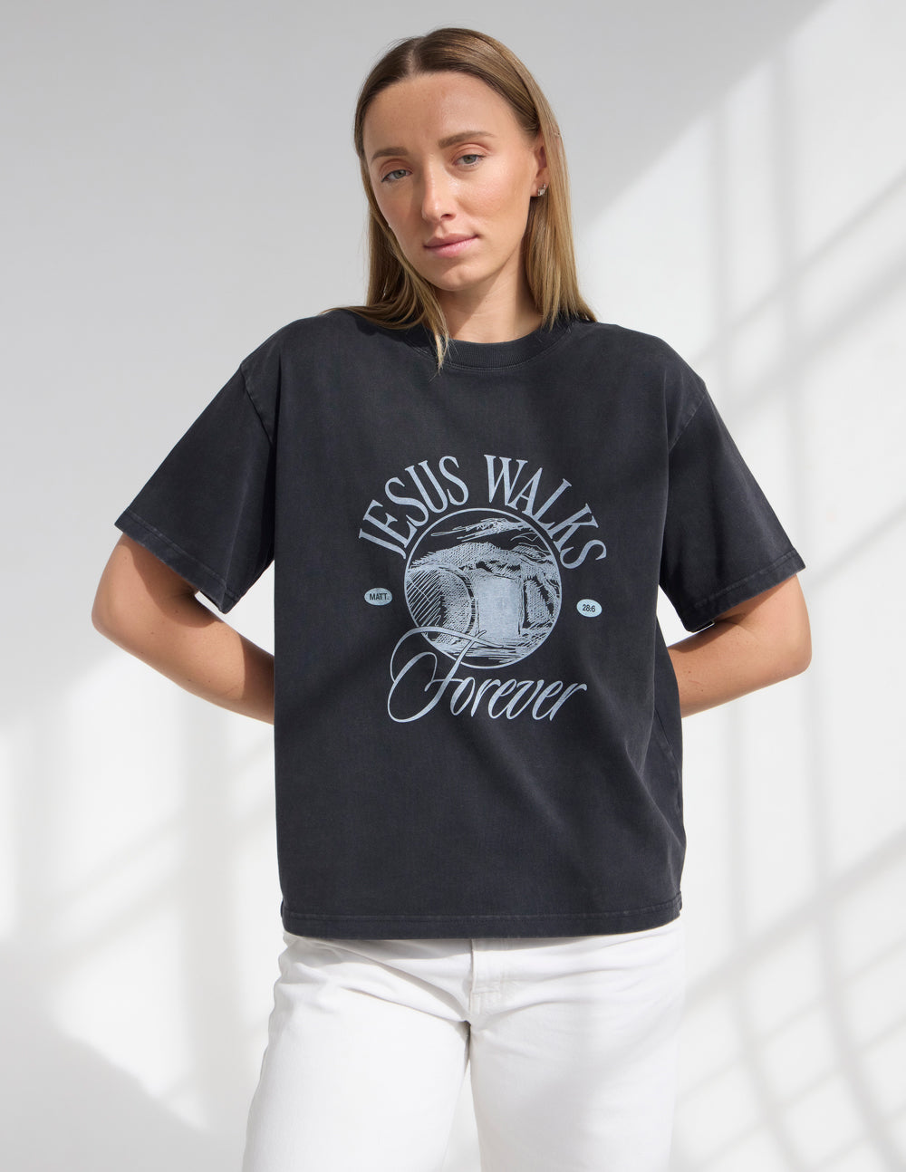 Elevated Faith Jesus Walks heavyweight T-shirt featuring a bold graphic design on soft, comfortable cotton fabric.