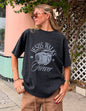 Black Jesus Walks heavyweight T-shirt by Elevated Faith featuring a bold graphic design on the front.