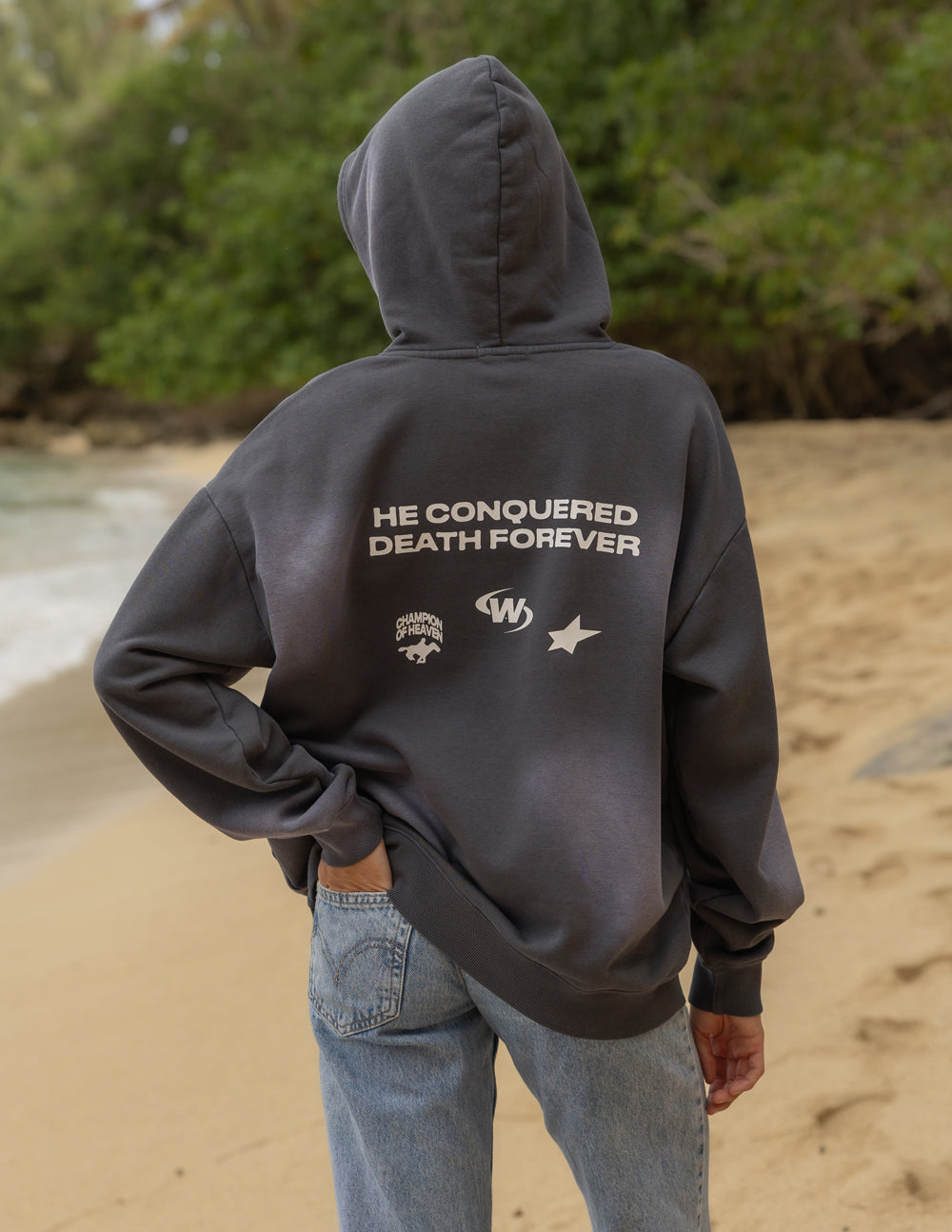 Unisex hoodie featuring a Jesus Wins design by Elevated Faith, shown in a casual fit with a front graphic print.