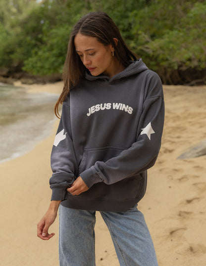 Unisex hoodie featuring Jesus Wins design by Elevated Faith, casual clothing with Christian-inspired graphic on front.