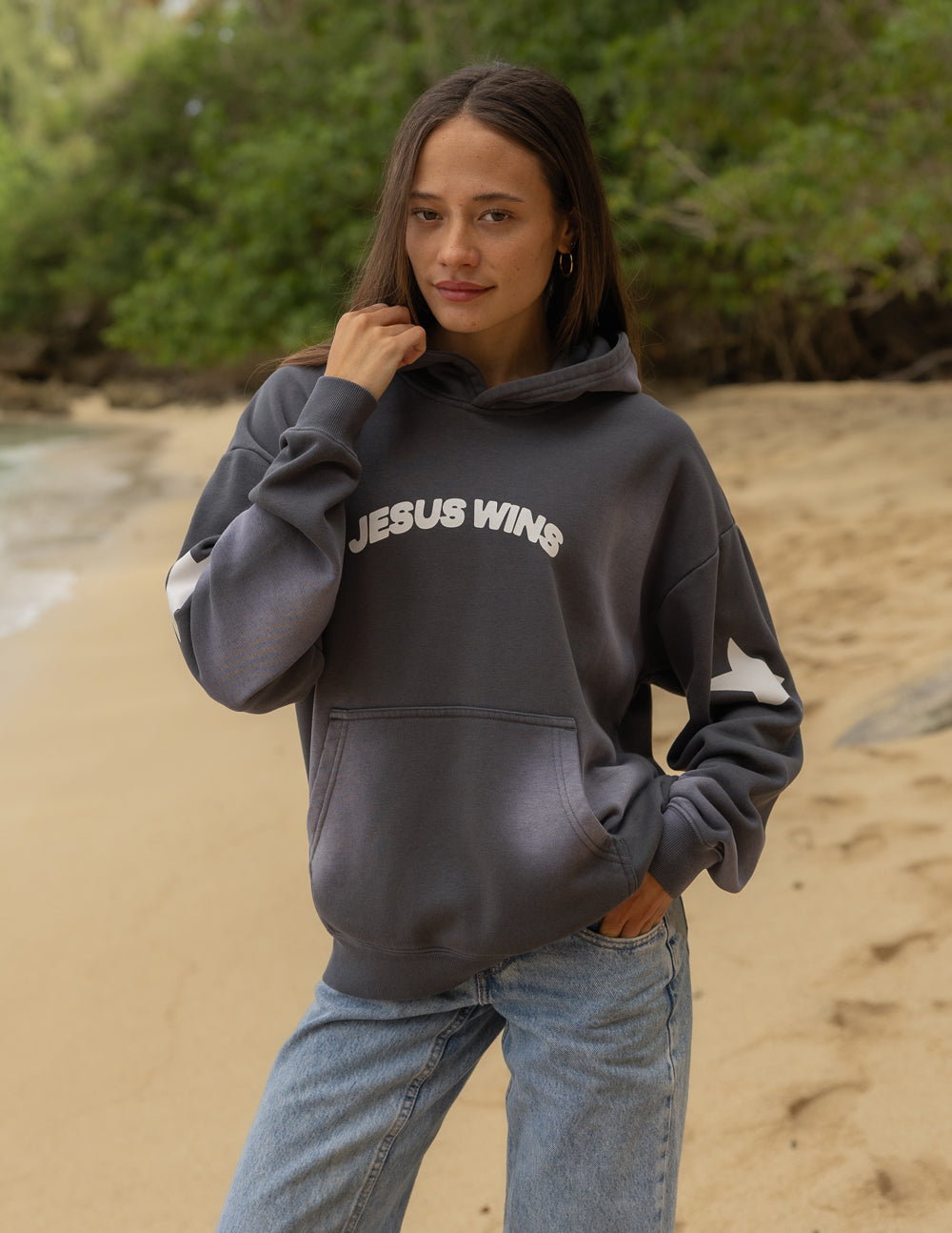 Unisex hoodie featuring "Jesus Wins" design by Elevated Faith, showing the front view with comfortable fit and bold graphic print.