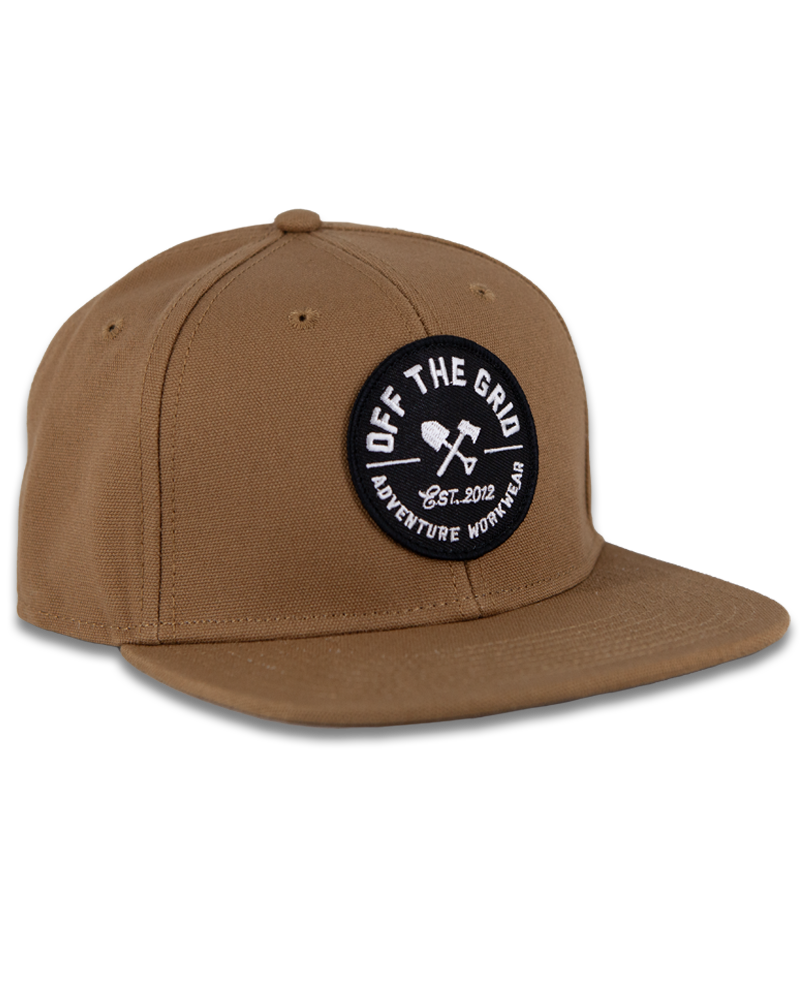 Off The Grid Surplus Jobsite Hat in tobacco color, durable work hat with a wide brim and adjustable strap for outdoor jobs.
