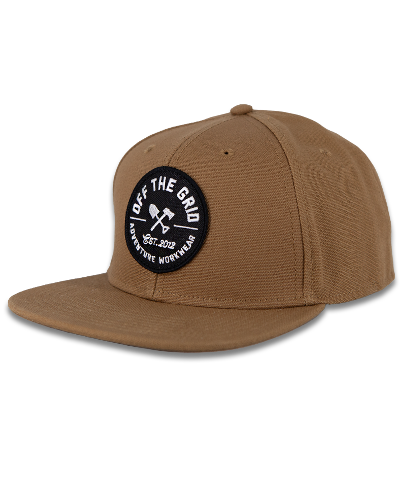 Off The Grid Surplus jobsite hat in tobacco color, durable work hat with adjustable strap and ventilation for outdoor construction work.