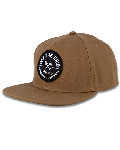 Off The Grid Surplus jobsite hat in tobacco color, durable work hat with adjustable strap and ventilation for outdoor construction work.