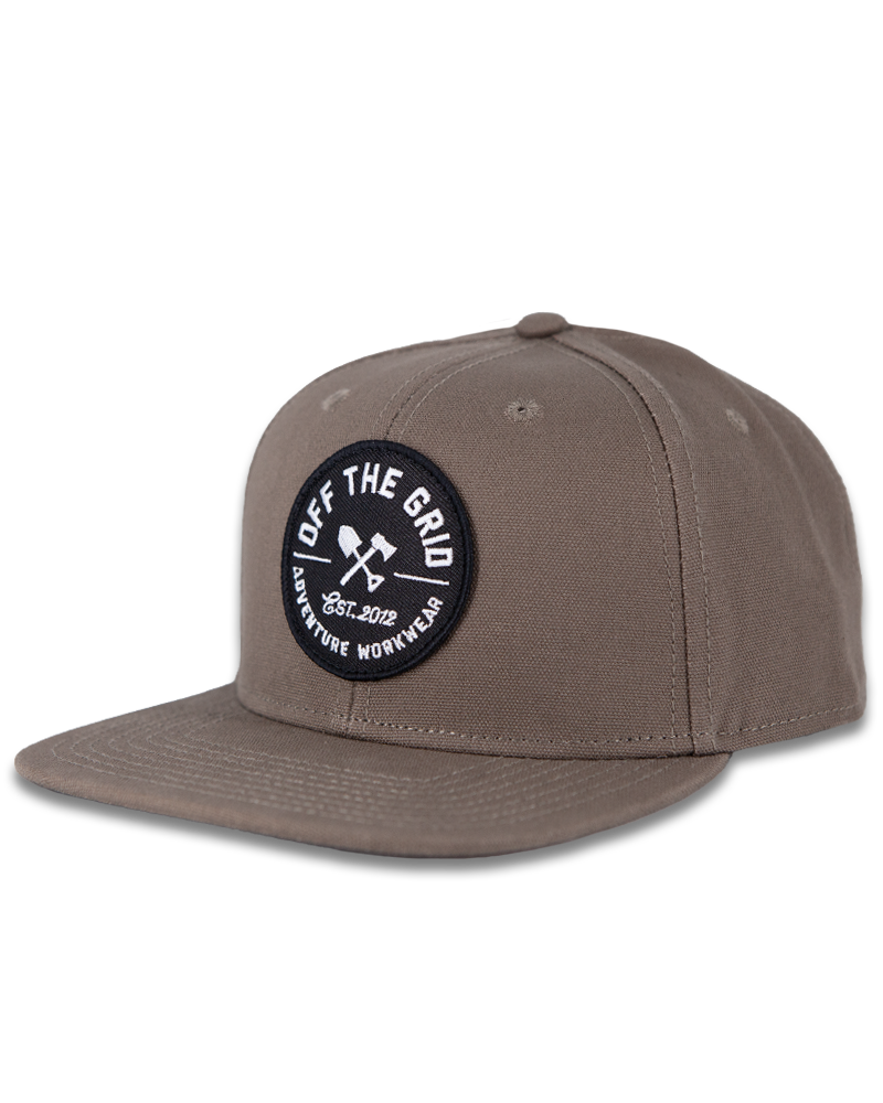 Off The Grid Surplus walnut jobsite hat showing a sturdy construction and wide brim designed for outdoor work.
