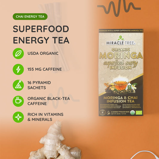 Organic Moringa Energy Tea by Miracle Tree featuring chai flavor, a natural coffee alternative with vibrant tea leaves in a clear cup.