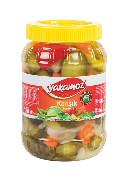 Glass jar of S101 Yakamoz mixed pickles with colorful vegetables inside, showcasing a variety of preserved pickled vegetables.