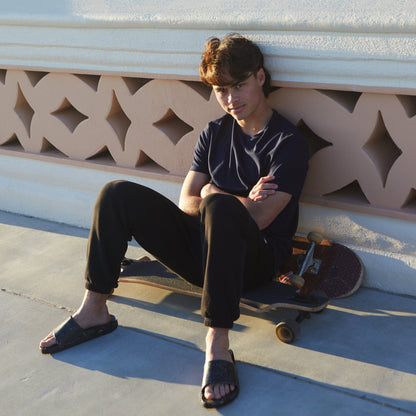 Fleks East Beach Slide in Night color, featuring comfortable slide sandals with a sleek design and casual style.