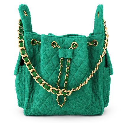 Small Kelly green Bayshore Bucket Bag from BEACH HAUS with a woven texture and leather drawstring closure.