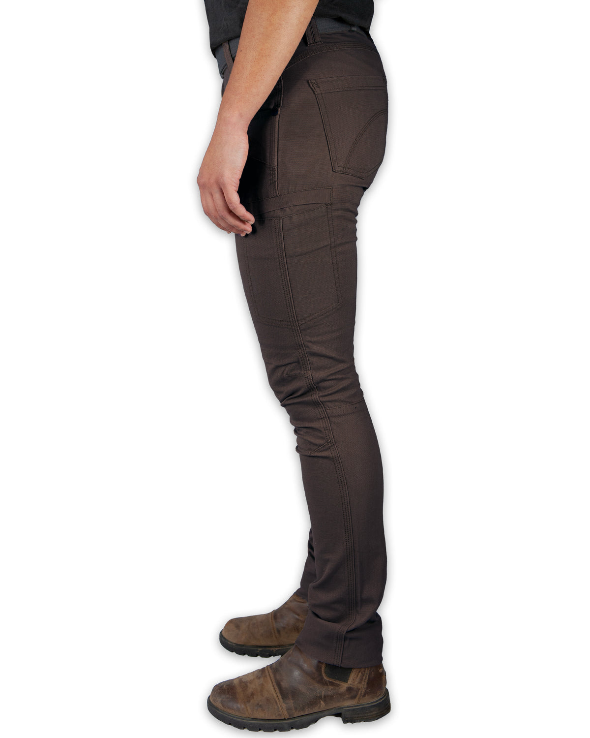 Dark brown Kestral women's pants by Off The Grid Surplus, showing the relaxed fit and durable fabric details.