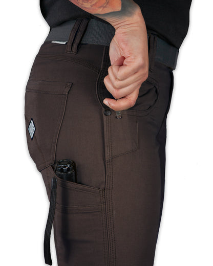 Dark brown Kestral women's pants from Off The Grid Surplus, shown with a relaxed fit and casual style.
