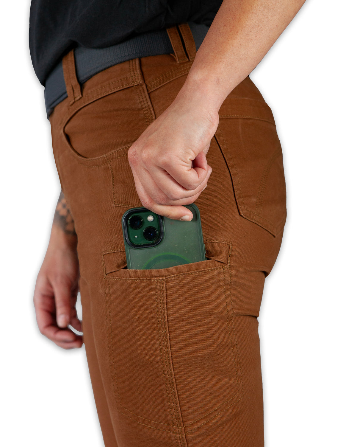 Kestral women's pants in tobacco color from Off The Grid Surplus, casual fit with front pockets and tapered leg design.