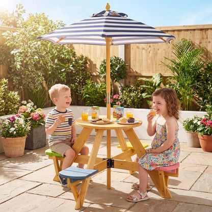 Kids picnic table with attached stools and foldable adjustable umbrella, ideal for backyard and patio play areas.