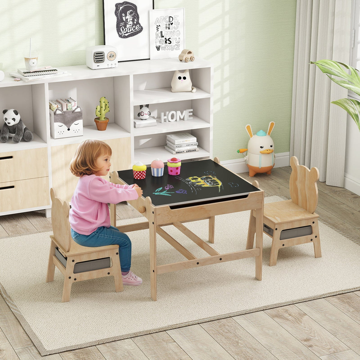 Kids table and chair set with reversible whiteboard, wooden frame, and colorful chairs for children’s play and learning.