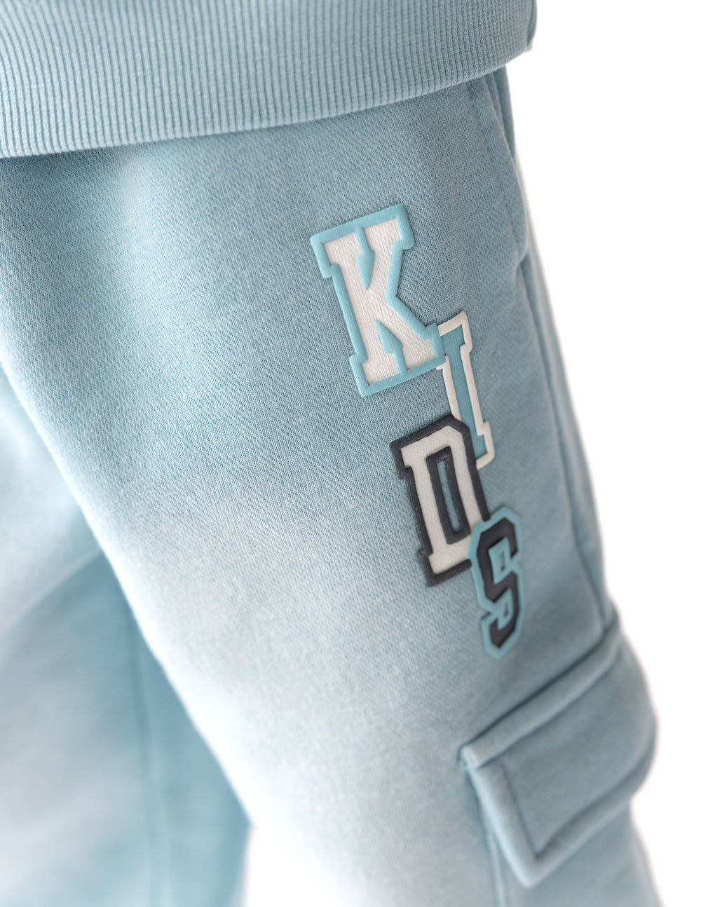 Kids cargo sweatpants by Elevated Faith featuring a comfortable fit and casual style, shown in a front view.