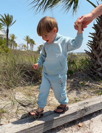 Kids cargo sweatpants by Elevated Faith with multiple pockets and a comfortable fit, perfect for active children.