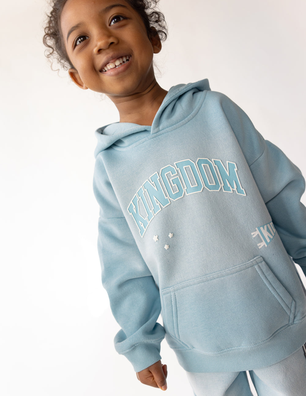 Kids hoodie by Elevated Faith featuring a Kingdom Kids design, soft fabric, and vibrant colors ideal for children.