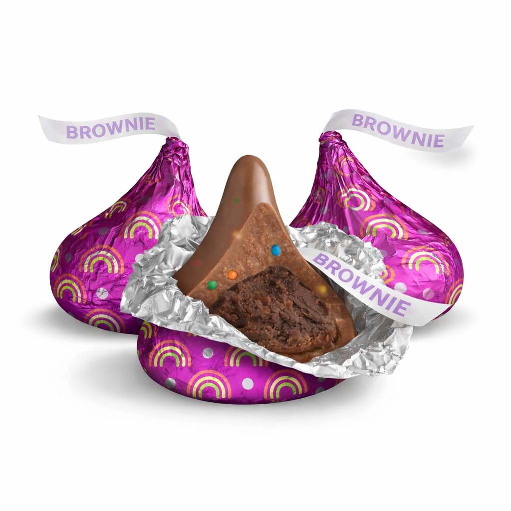 Hershey's Kisses Rainbow Brownie flavored chocolate candies in a bulk Candy In Bulk bag, showing colorful chocolate kisses on the package.