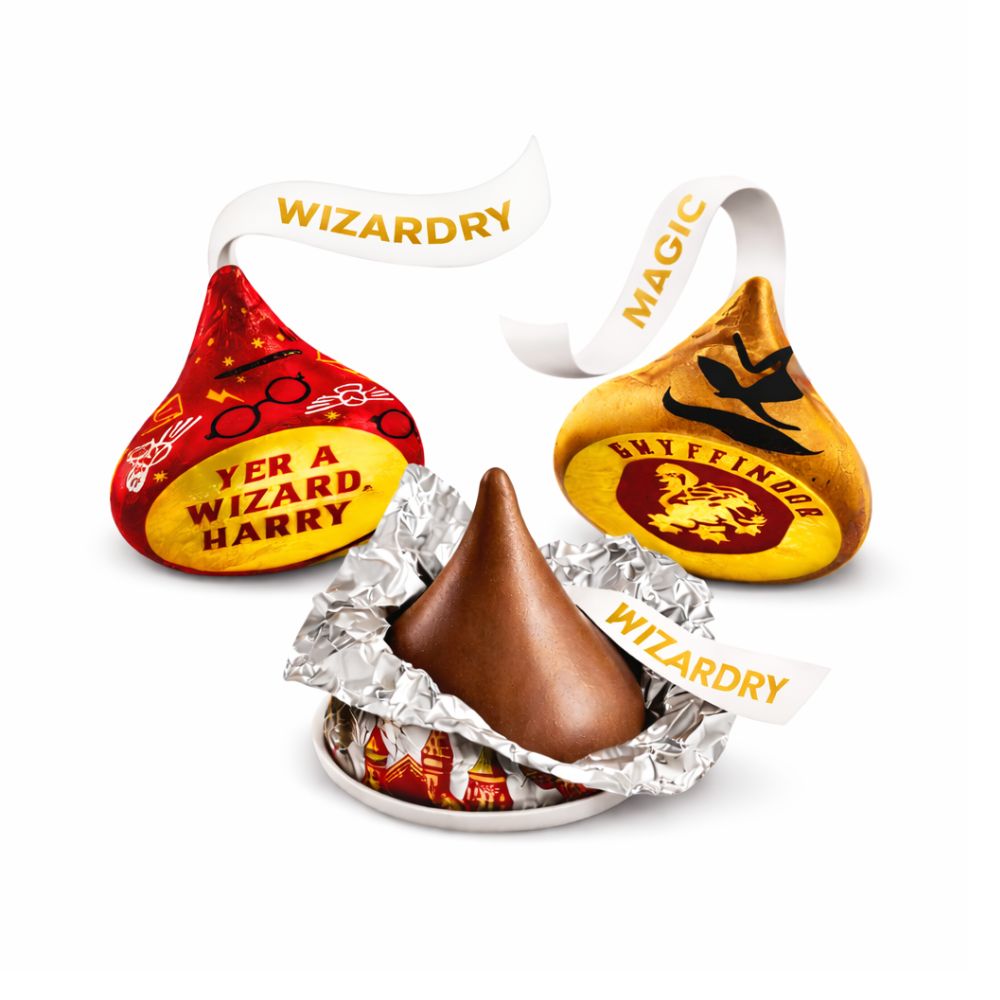 Hershey's Kisses Milk Chocolate with Harry Potter foil wrappers in a bulk Candy In Bulk bag, featuring iconic Harry Potter designs.