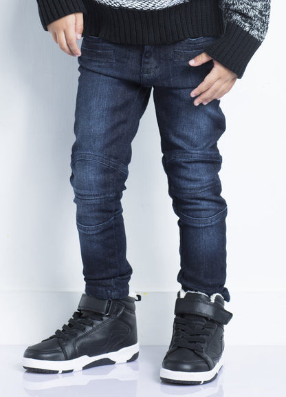 Dark biker jeans by IndigoPaper featuring a fitted design and classic denim look, shown on a model.