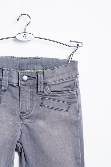 Grey biker jeans by IndigoPaper, featuring a fitted design with stitched detailing and classic denim texture.