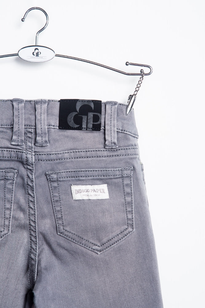 Light grey IndigoPaper biker jeans with classic five-pocket design and slim fit, displayed on a white background.