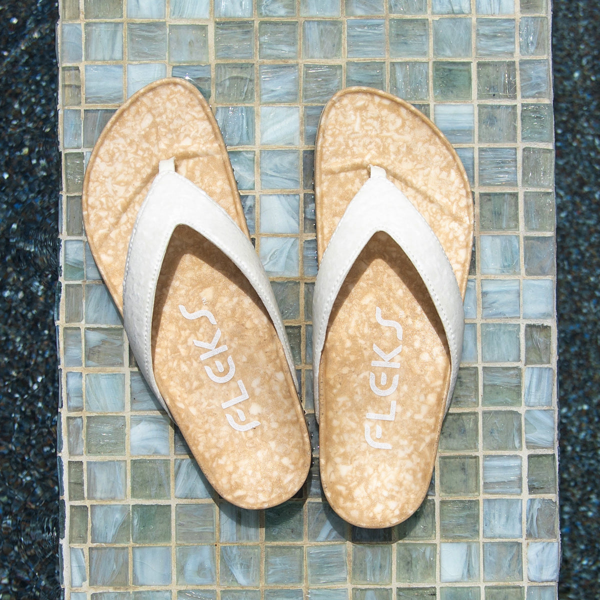 Fleks West Beach Flip Flop in oatmeal color, casual footwear with cushioned straps and rubber sole, suitable for beach and casual wear.