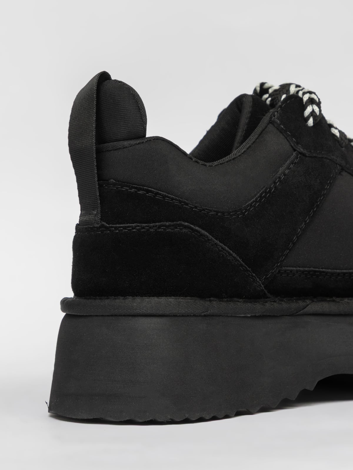 Black women's casual footwear by L'ARTE MILANO, stylish and comfortable shoes with a sleek design for everyday wear.