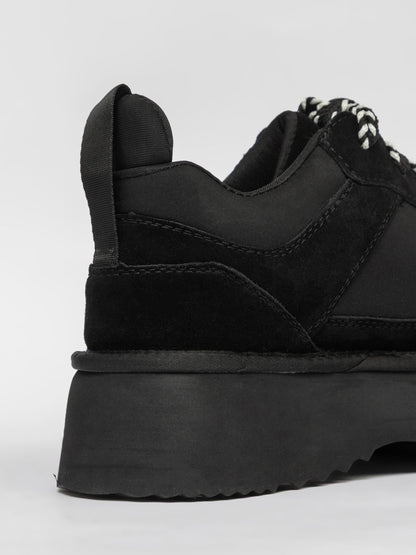 Black women's casual footwear by L'ARTE MILANO, stylish and comfortable shoes with a sleek design for everyday wear.