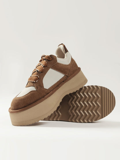Women's casual footwear by L'ARTE MILANO, featuring comfortable slip-on shoes in chestnut color with stylish design.