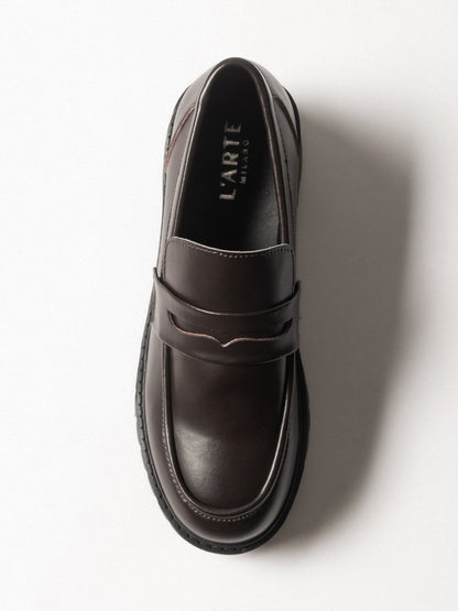 Women's leather footwear by L'ARTE MILANO, stylish dark brown shoes with sleek design and comfortable fit.