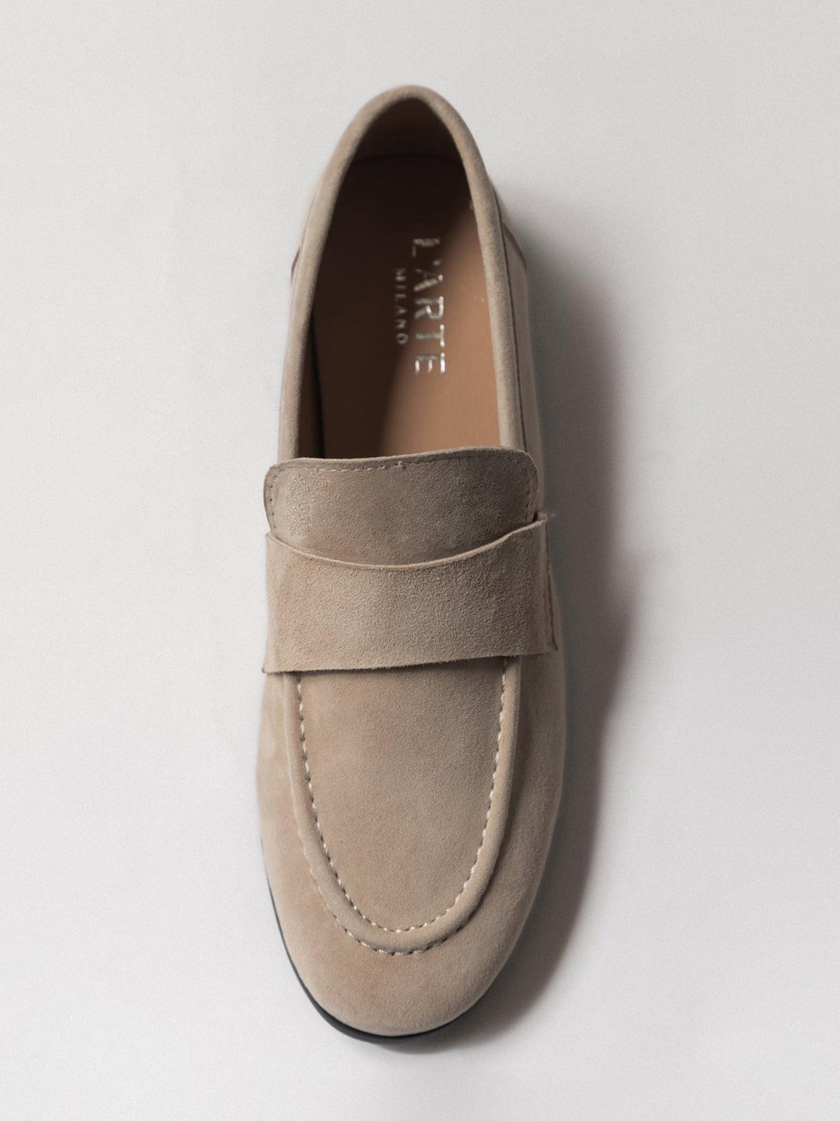 Women's leather footwear by L'ARTE MILANO featuring stylish tan shoes with sleek design and comfortable fit.