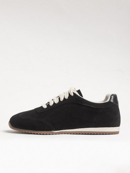 Black women's leather casual shoes by L'ARTE MILANO featuring a sleek, comfortable design with a rounded toe.