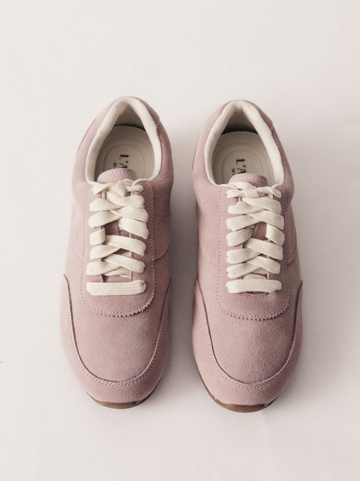 Pink women's leather casual shoes by L'ARTE MILANO, showcasing stylish footwear with a comfortable design.