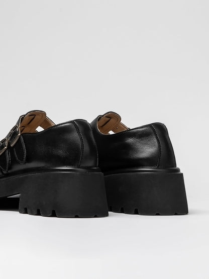 Women's leather shoes by L'ARTE MILANO featuring classic design and polished finish, perfect for stylish footwear.
