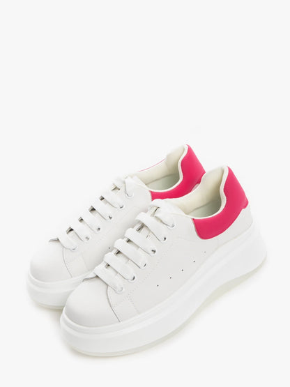 Women's casual footwear by L'ARTE MILANO, pink slip-on shoes with comfortable design and stylish details.