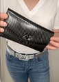 Assure Fashion women's designer wallet in sleek carbon color, featuring multiple card slots and a secure coin compartment.