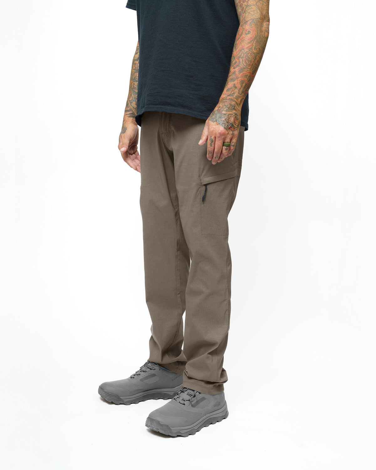 Off The Grid Surplus Lancer Taper Fit Pant in Deadwood color, showing tapered design and durable fabric with front pockets.