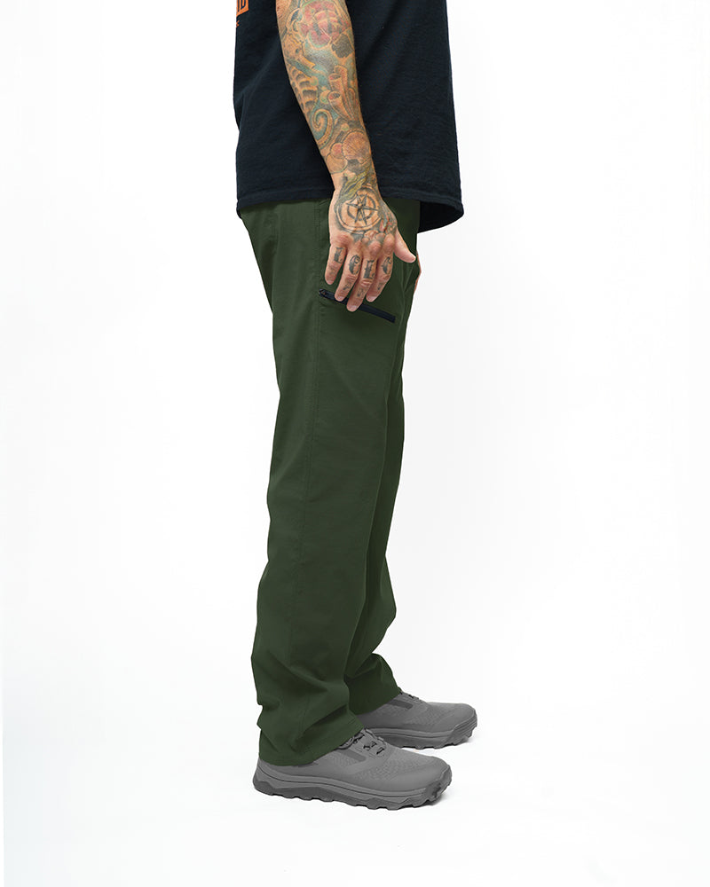 Off The Grid Surplus Lancer standard fit pants in dark army green, featuring a relaxed fit and multiple pockets.