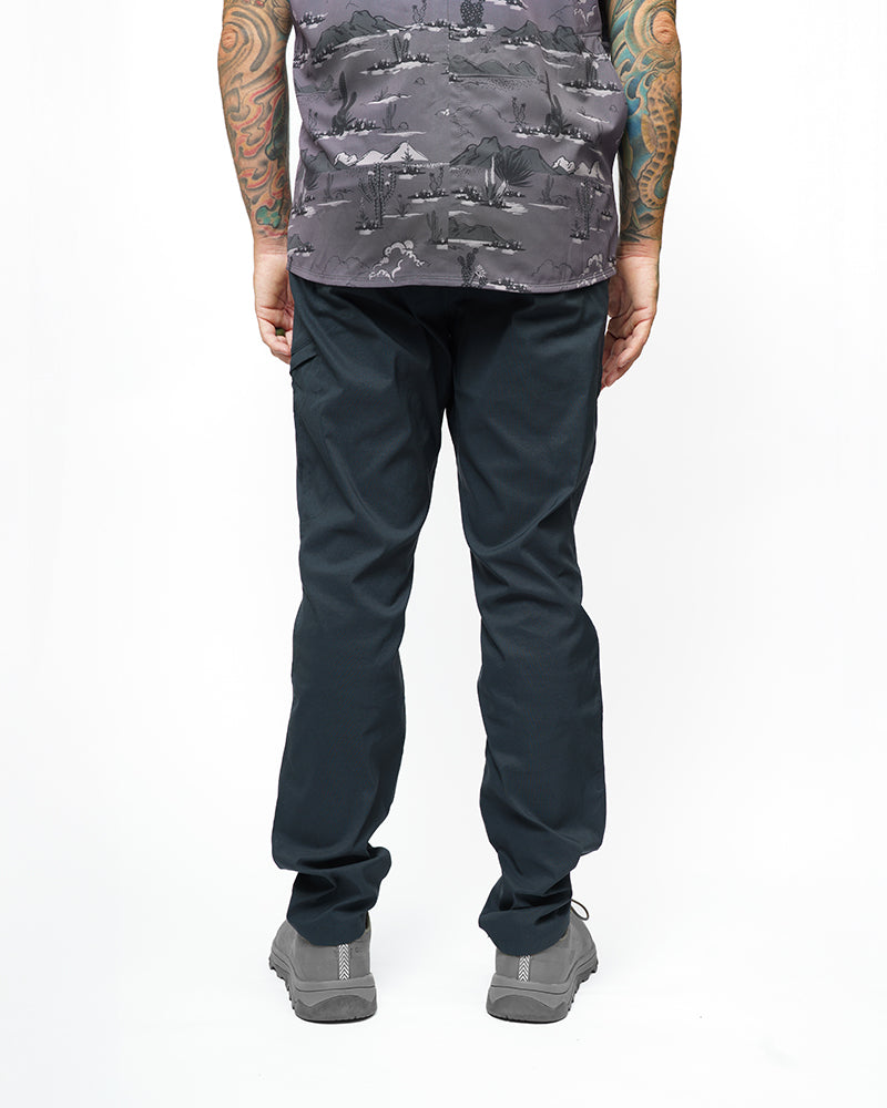 Off The Grid Surplus Lancer Taper Fit Pant in Vulcan Navy, showing navy tapered pants with a relaxed fit and modern style.