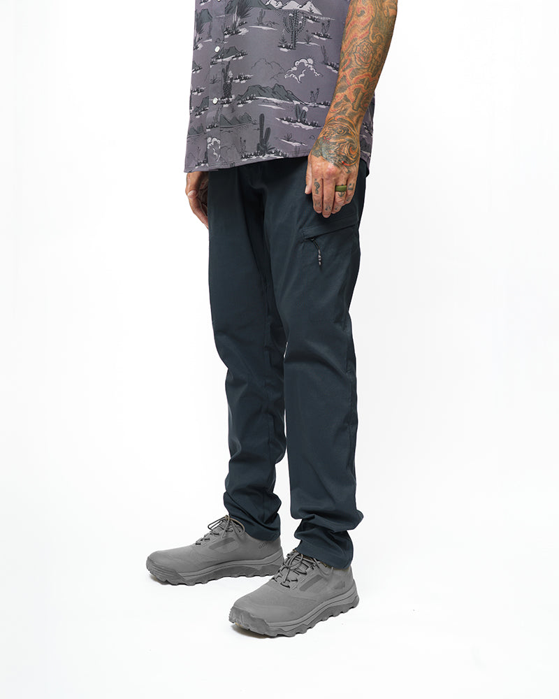 Off The Grid Surplus Lancer Taper Fit pants in Vulcan Navy, showing a close-up of the tapered navy pants fabric and fit.