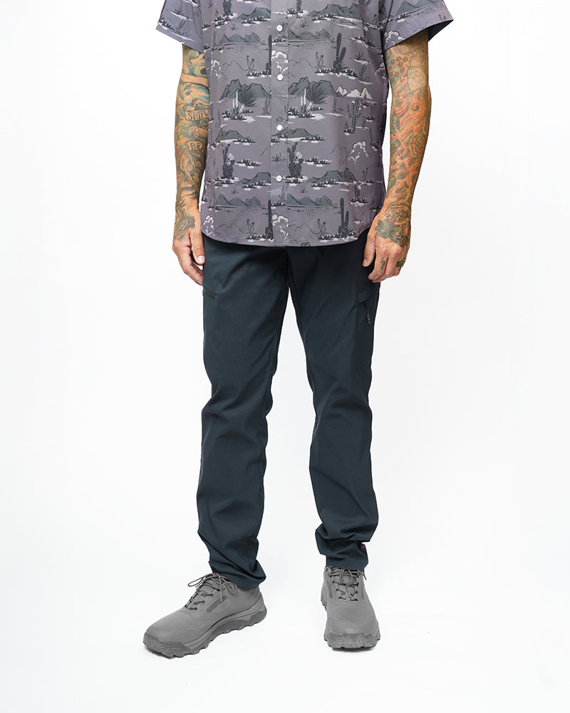 Off The Grid Surplus Lancer Taper Fit Pants in Vulcan Navy, showing the slim-fit design and durable fabric details.