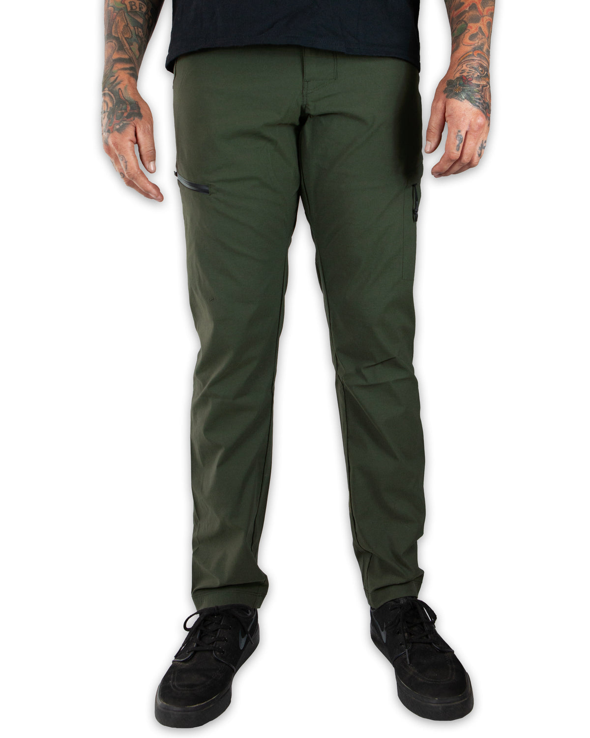 Dark army green taper fit pants by Off The Grid Surplus, featuring a modern design and tapered leg style.