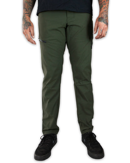 Dark army green taper fit pants by Off The Grid Surplus, featuring a modern design and tapered leg style.