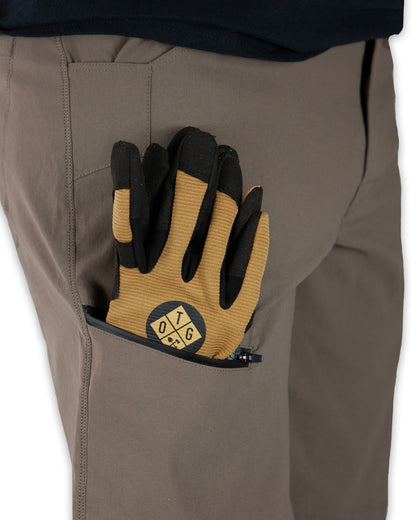 Off The Grid Surplus Lancer Taper Fit Pant in Deadwood color, showing slim fit design and durable fabric details.