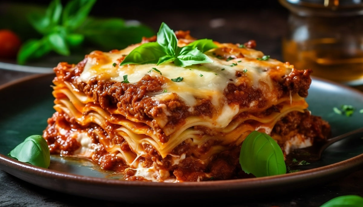 Foundation Outdoors lasagna meal featuring layered pasta, cheese, and rich tomato sauce in a ready-to-eat meal presentation.